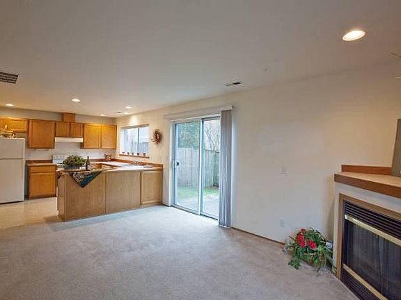 Open layout from living room to kitchen.