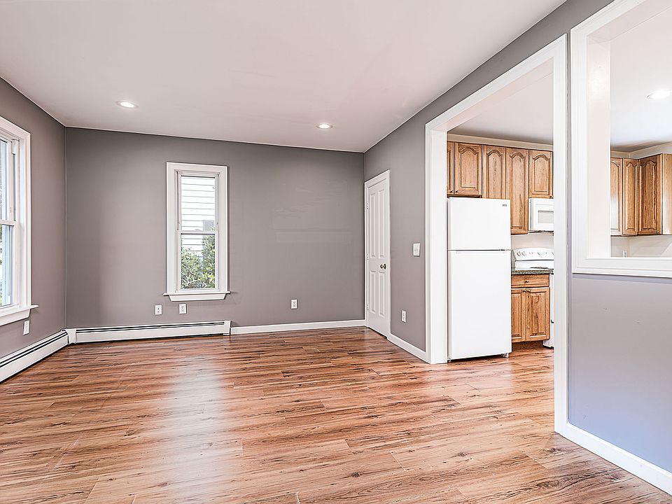 main floor living room, door to basement (laundry)