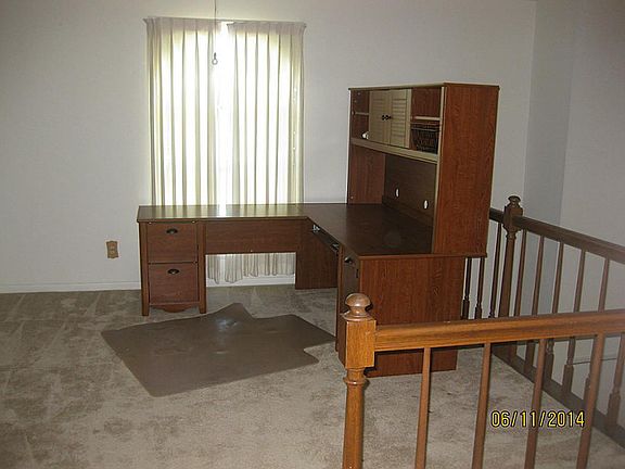 Upstairs game room or office.