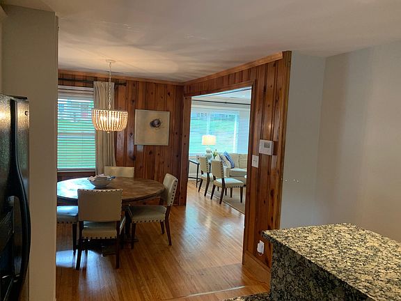 Open floor plan. Looking from kitchen past dining room, into living room.