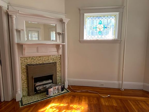 Living room mantle -- (antique gas fireplace now purely decorative)