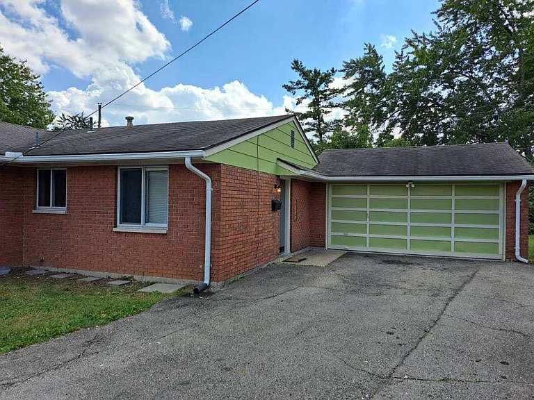 Front of the property and Garage