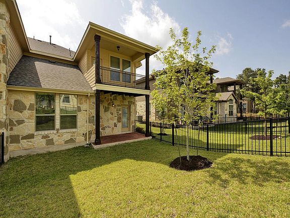 Covered walk-out patios. Landscape is maintained by the association. Lower patio door from Kitchen.