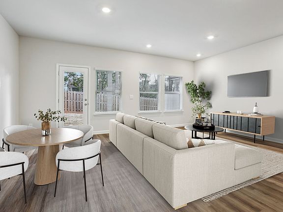 The Amber floorplan in the Charm Burlap interior package.