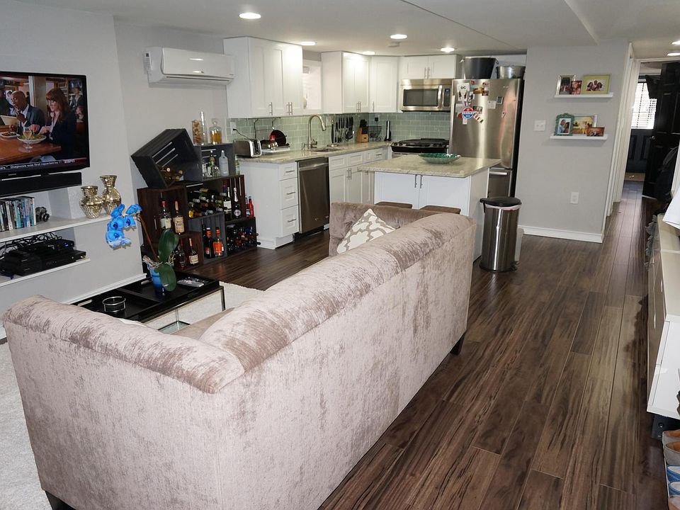 Living Room and Open Kitchen - Granite Countertops and Islan