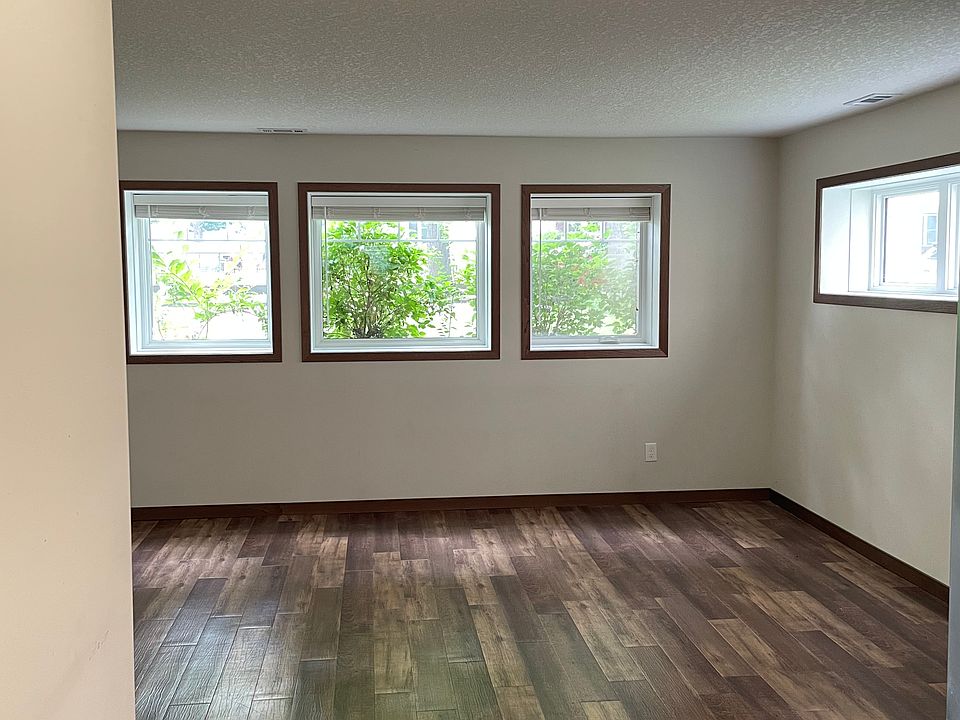 Wider view of living room.