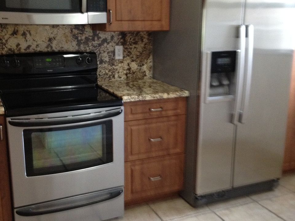Updated Kitchen with Stainless steel appliances and granite