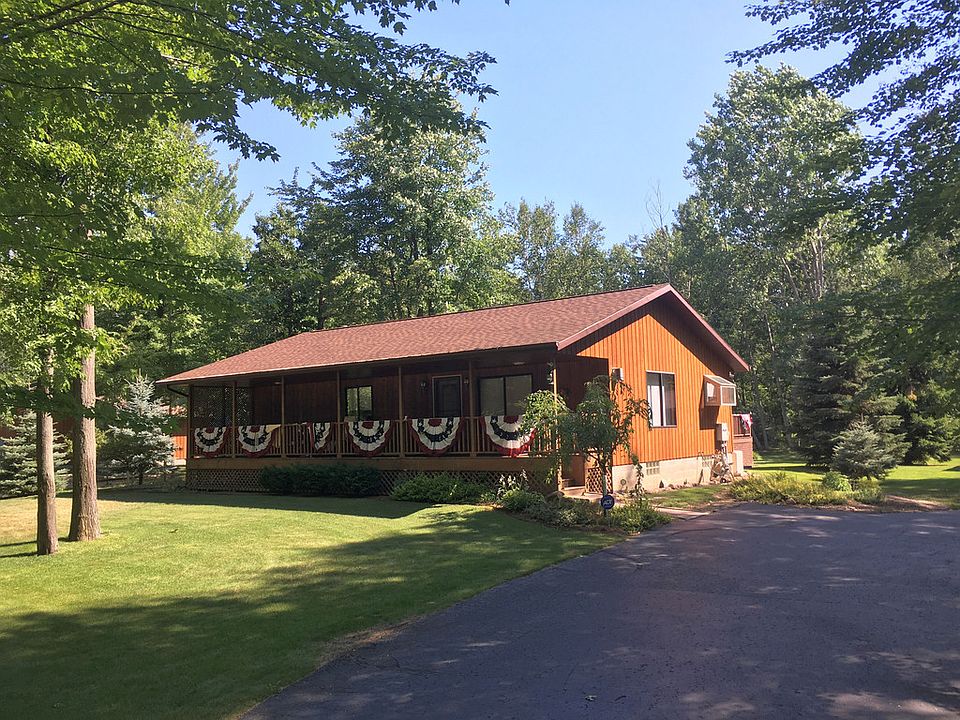 3 bedroom 2 bath house located on 2.8 wooded acres. The house has a new furnace, and the carpet is less than 2 years old. It is Walking distance to McGraw Park. The house also has a built in generator for peace of mind. This has an open floor plan with a gas fireplace in the living room. The back deck is great to enjoy those cool summer days while the Front Porch is ideal shade for those Warm Summer days. The full basement could be finished for more living space. Call for your personal showing.