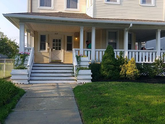 Apartment is on the first floor. Living room windows face front porch.