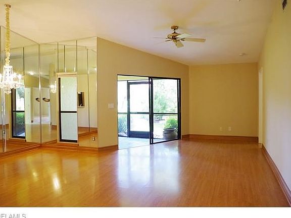 Custom Mirrors for lots of light, easy laminate floors.