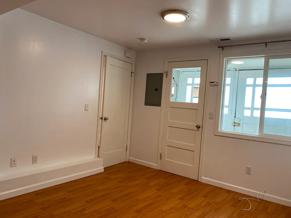 Another view of Dining Area/Living Room with storage