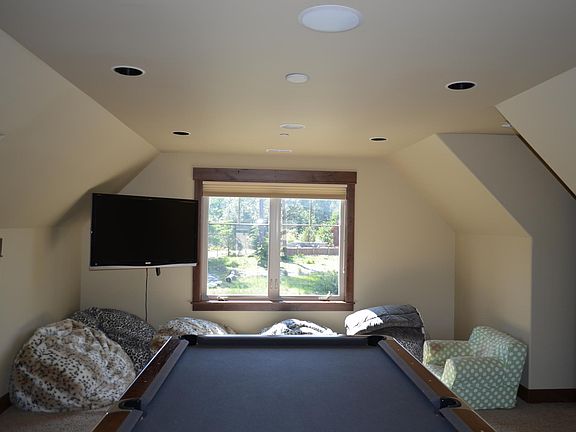 Play room upstairs with full-size pool table and wall-mounted big screen. Hours of fun!