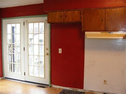 Second view of kitchen - French door provides access to deck.