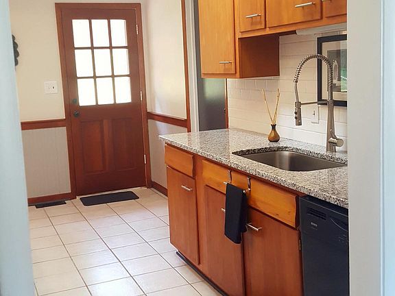 Original mid-century modern cabinets. Tile backsplash, high 