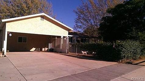 Front of house with lots of parking.