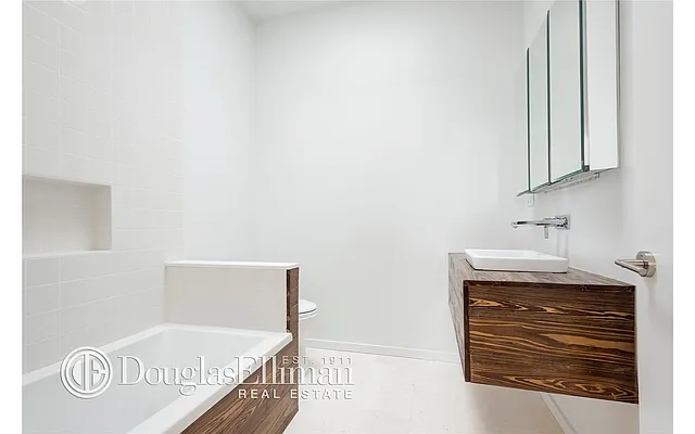 Sold by Douglas Elliman | media 18