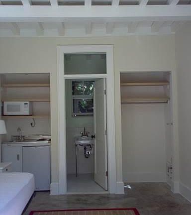 Kitchenette, closet and bathroom beyond