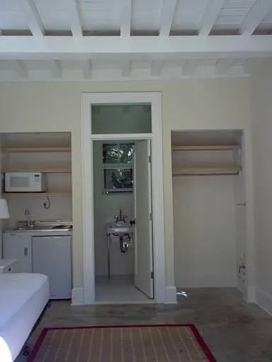 Kitchenette, closet and bathroom beyond