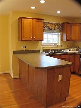 VIEW OF KITCHEN...HOME HAS BEEN FRESHLY PAINTED THROUGHOUT...MOVE-IN READY.