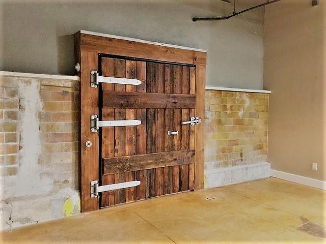147 - Detail of Faux Door hand crafted from old Rath Packing smokehouse wood