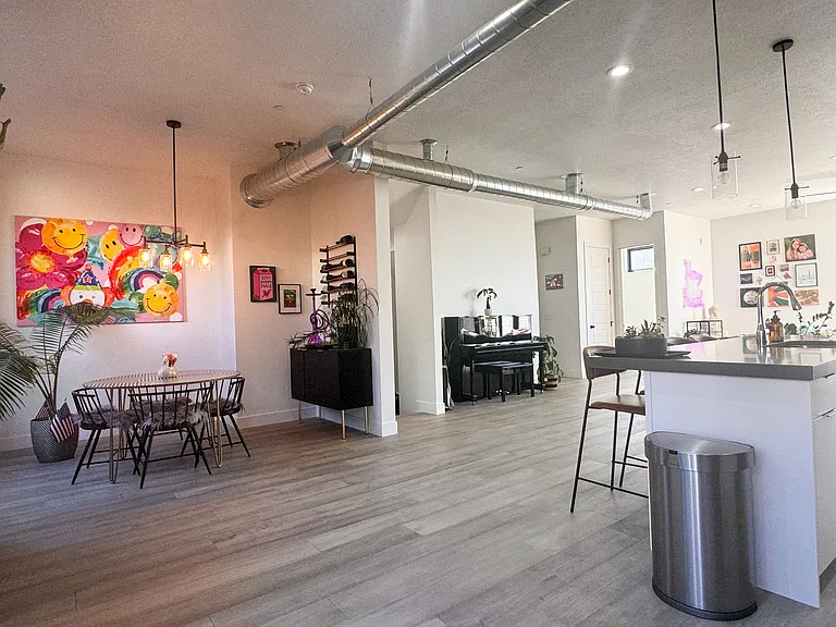 2nd floor open space with living room, kitchen, and dining area.