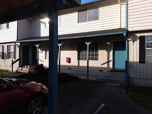 One covered parking spot plus one other parking spot.