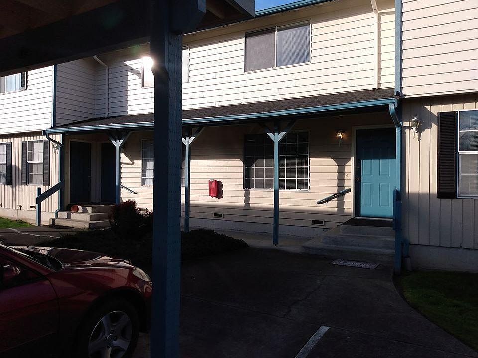 One covered parking spot plus one other parking spot.