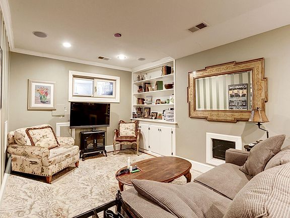 Living room with built-in cabinets.