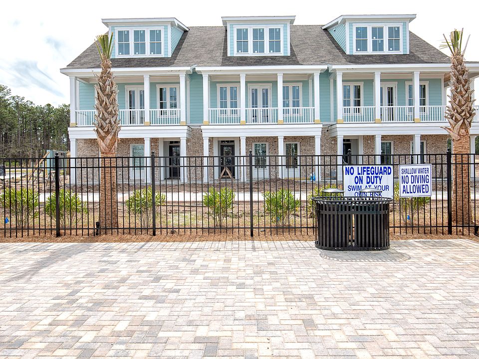 Townhomes A, B, and C adjacent the community clubhouse and pool
