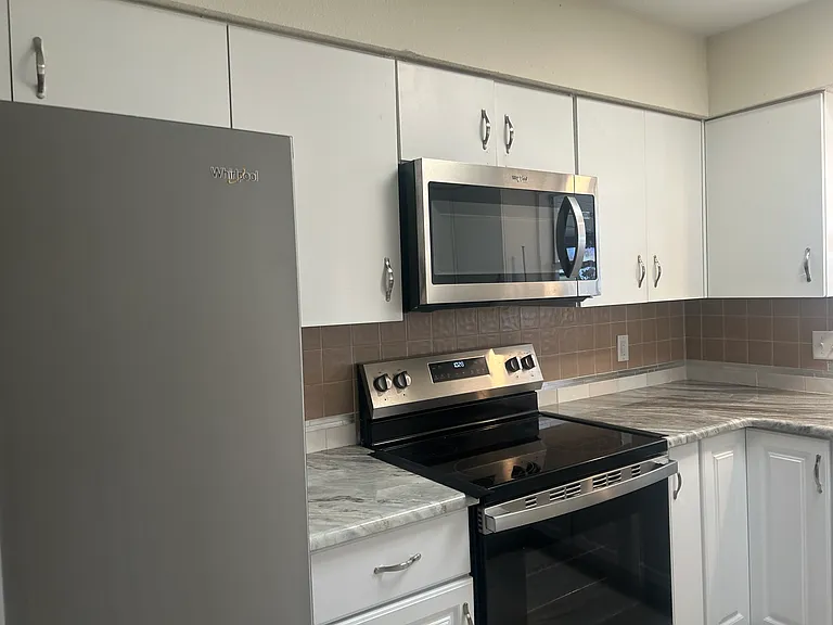 more kitchen with new appliances
