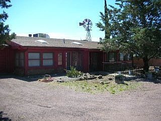 Front, garage to left