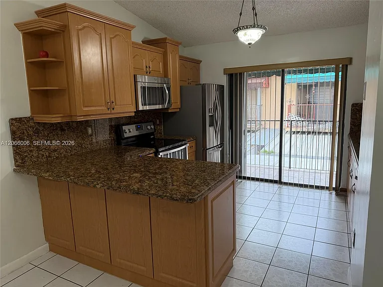 7792 W 29th Way #202 — Photo 4