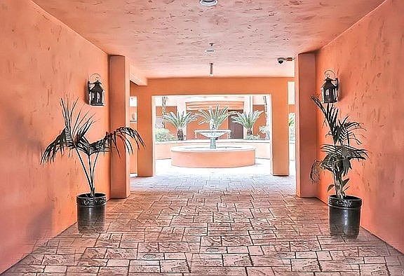 Entry to interior patio beyond gate