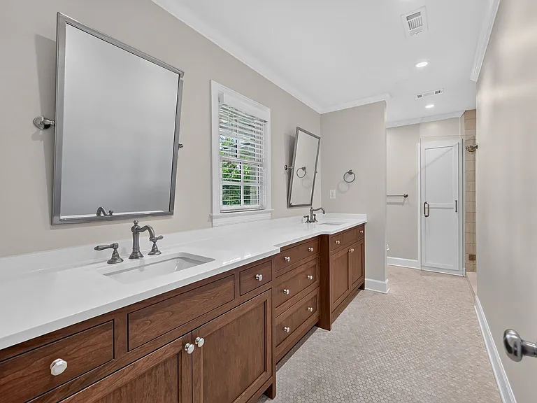 Large master bathroom with double vanities.
