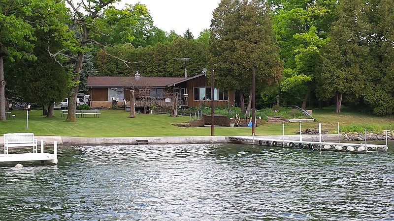 Front of House from Lake
						:
						Beautiful Ranch Home on Big Cedar Lake!