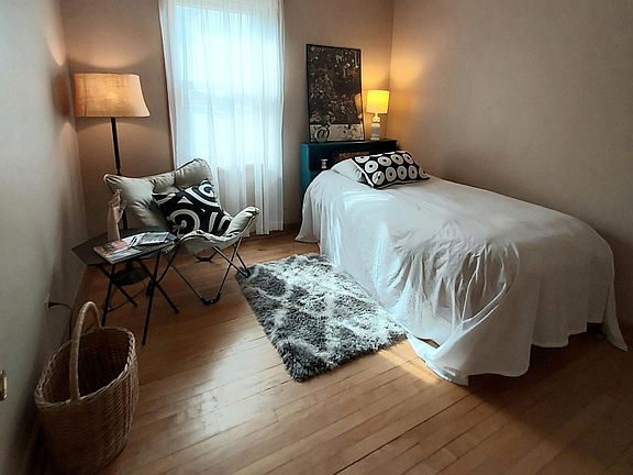This bedroom comfortably fits a double. Twin bed shown. Large closet