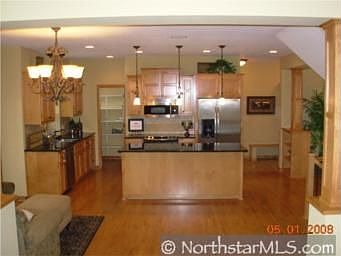 Kitchen Complete with Tons of recessed lighting, GE Profile Stainless Applianc
