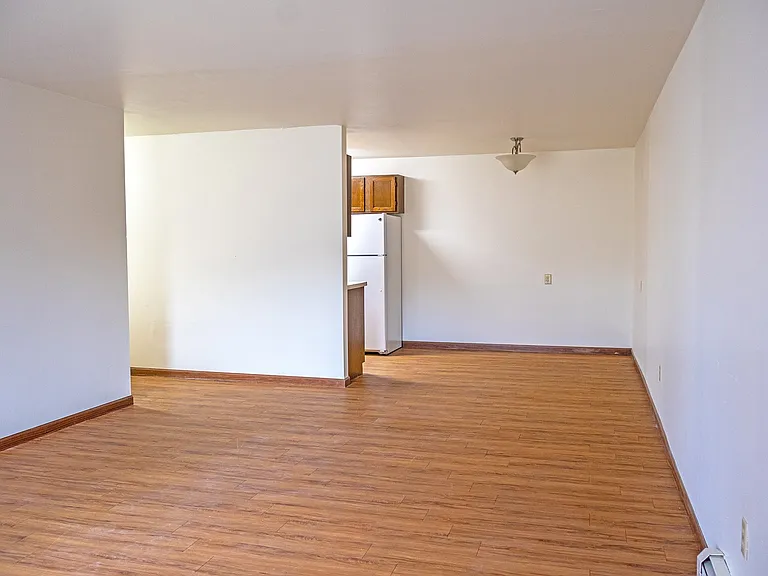 Step into the spacious living area of The Gallery, where natural light floods the room, enhancing its welcoming vibe. Modern appliances and ample space create the perfect canvas for your personal touch. Schedule your visit today!