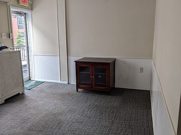 Front Room with Light from window and door. ( Bookcases and cabinet available for furnishings)