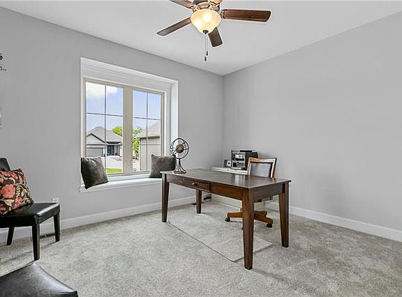 The Coventry s second bedroom on the main level could easily be used as a home office. PHOTO IS F