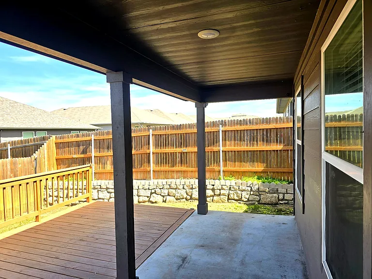 Covered patio provides shade and a comfortable outdoor area year-round.