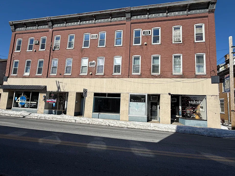 13-23 E High St