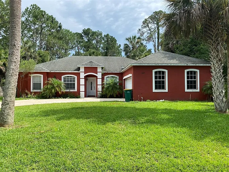 1004 Pine Tree Dr — Photo 1