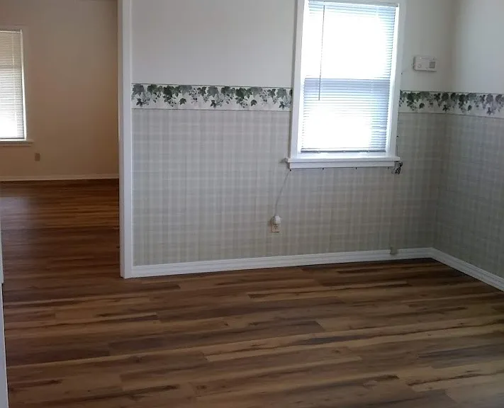 Dining area, doorway leads to living room