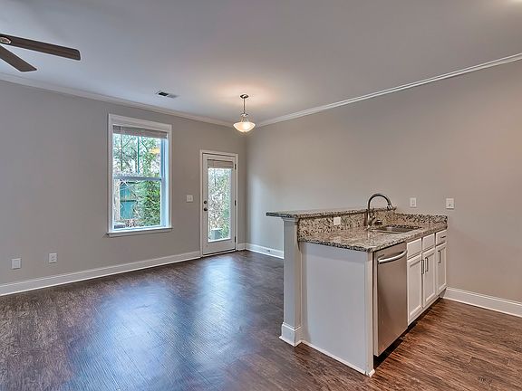 Kitchen and dining for the Charleston house plan.