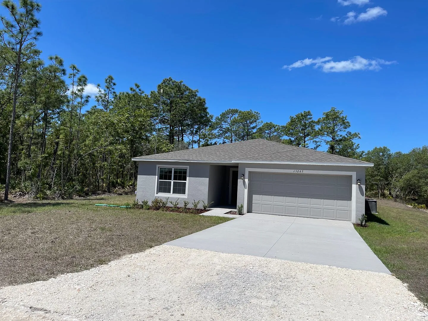 Beautiful four bedroom, two bath, two car garage and a half acre lot — Photo 1