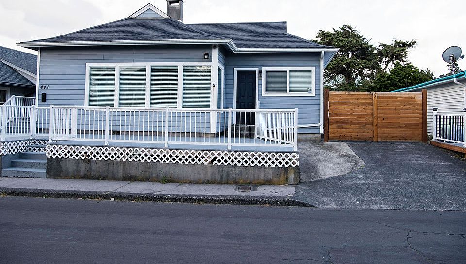 Street view, gated driveway entrance