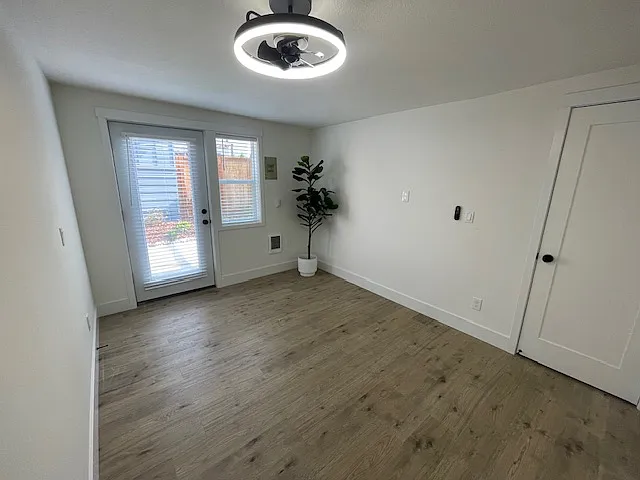 Large master bedroom with room for a king bed. Double hanging in the closet with an additional closet for the 40 gallon water heater and additional shelving