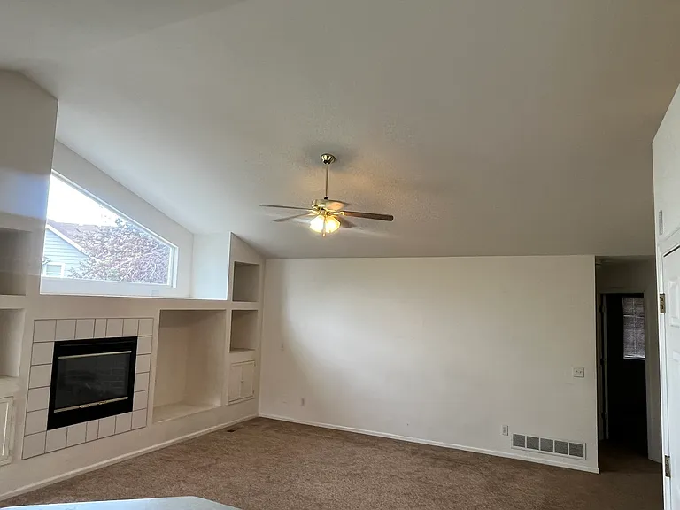 Family room with gas fireplace & entertainment center