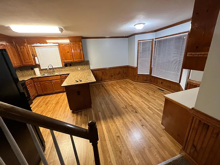 Photo of the kitchen and breakfast areas from the stairwell.